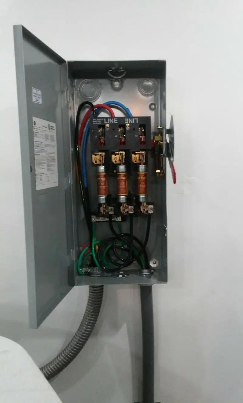Three-phase disconnect switch installed for Smoke Detector Installation in Harvard