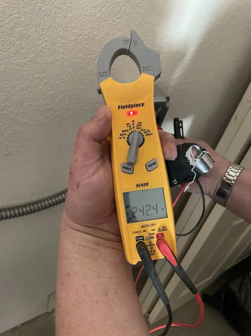 Voltage testing with clamp meter during Aluminum Wiring Replacement in Harvard